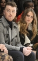 sam-smith-and-cara-delevingne-wearing-burberry-at-the-burberry-womenswear-autumn_winter-2015-show