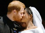 Prince Harry & Meghan Markle Kiss Following Wedding
