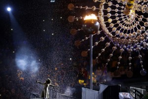 Marlene de Castro Performs Beneath Olympic Cauldron