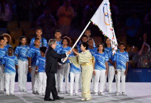 Thomas Back Hands Olympic Flag Over To Tokyo's Governor Yuriko Koike