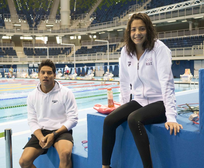 Refugee Team Swimmers:Rami Anis & Yusra Mardini at training poolstretching and swimming lapsRami Coach: Carine VerbauenYusra Coach: Sven Spannekrebsvisiting the Competition Pool after practice