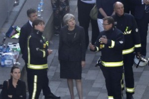 Theresa May Surveying Damage at Grenfell Tower
